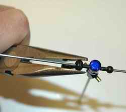 Sizing Ball Link To Reduce TBE