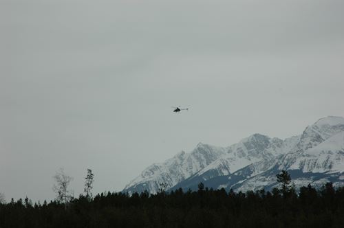 Radio Controlled Helicopter Silhouetted Against Sky Making Orientation Difficult